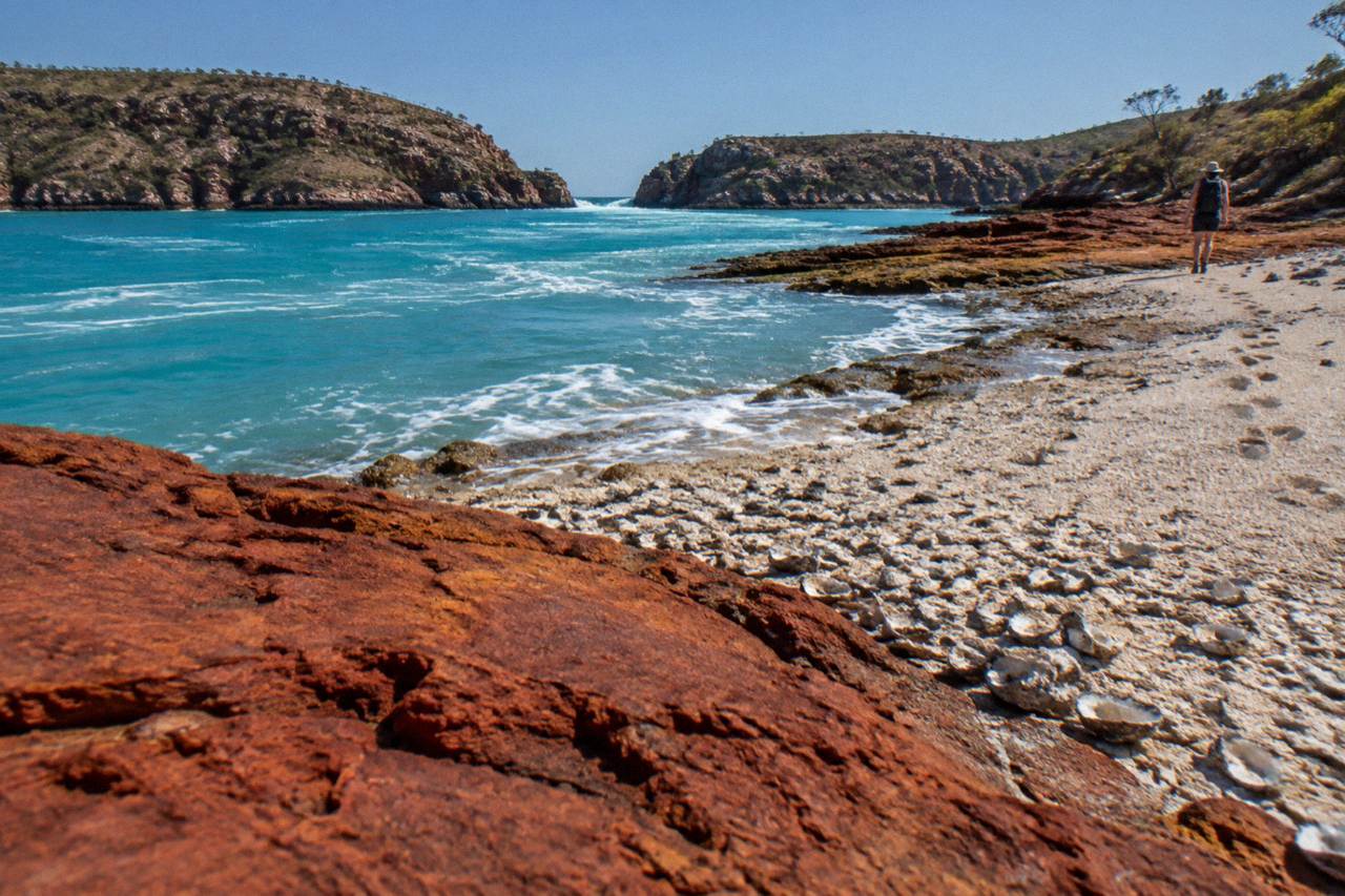 Turquoise water and red cliffs at Gantheaume Point near Broome under a clear dry season sky