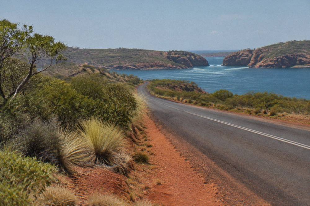 sealed Cape Leveque Road stretching through red pindan bushland